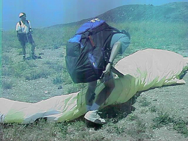 A puff a wind (from the wrong direction) messes up Kucan's paraglider layout