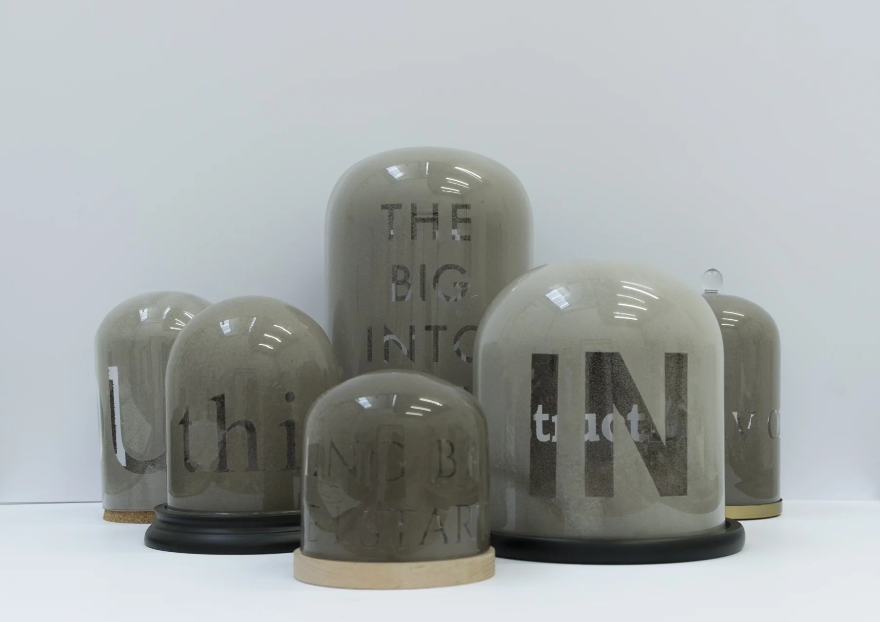 Gathering , 2019 Dust inside glass bell jars Variable measures