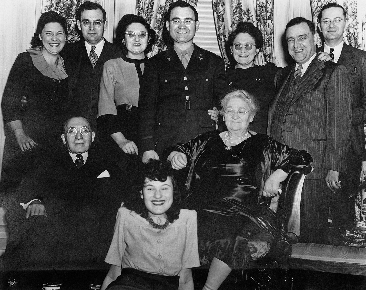 Adalman family during WWII: Top: Sylvia, Eli, Hannah, Philip, Rose, Ab, Sol. Middle: Hyman and Dora.  Front: Lilian