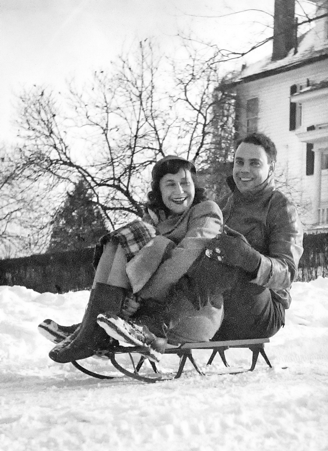 Anne and Doug sledding in Mt. Washington, Winter of 1947-48