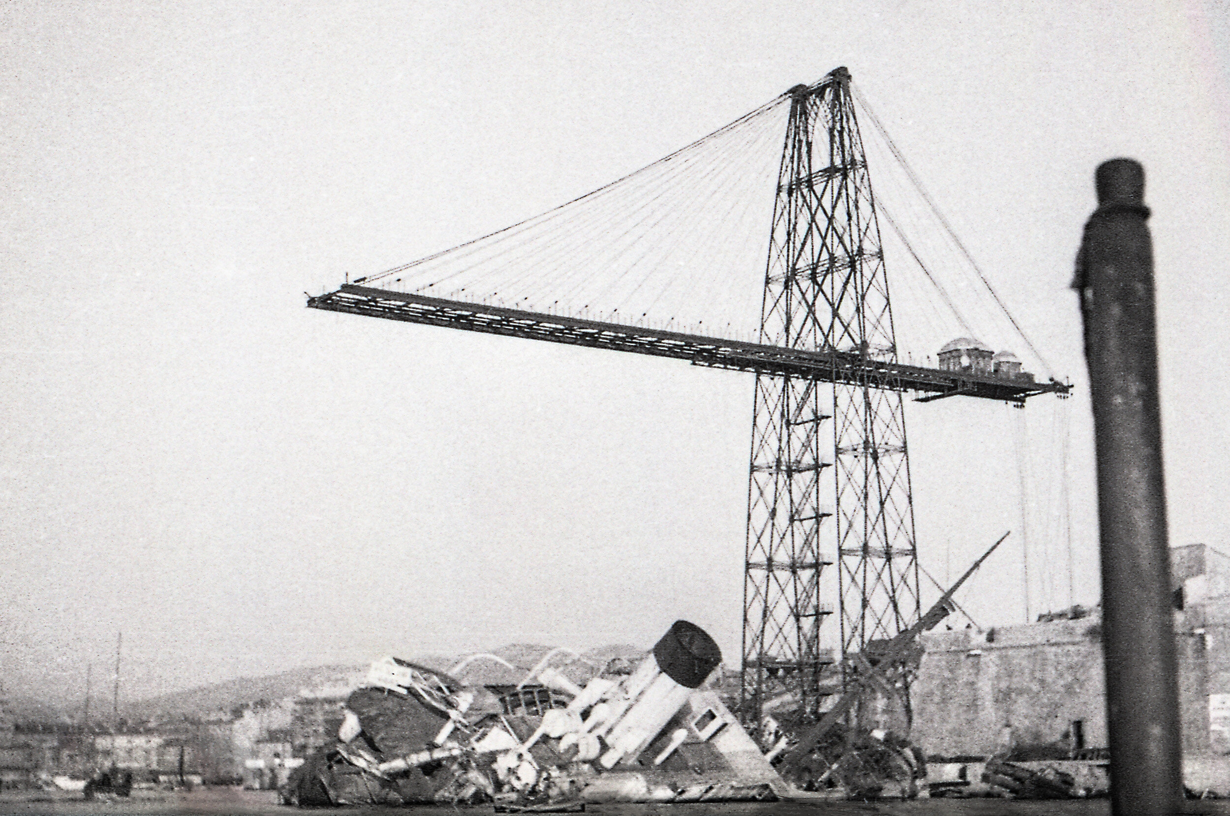 Port of Marseille in WWII, with ship wreckage and remains of the Marseille Transporter Bridge