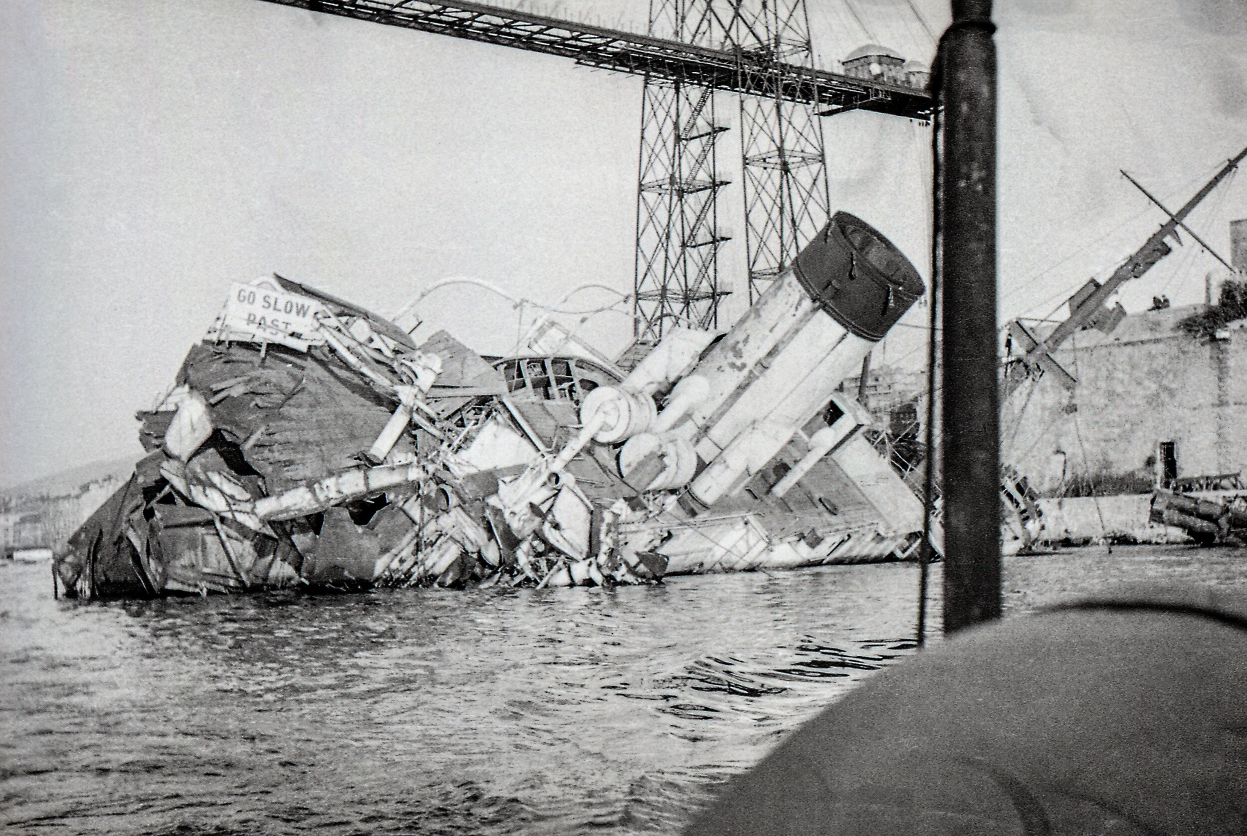 Port of Marseille in WWII, with ship wreckage and remains of the Marseille Transporter Bridge