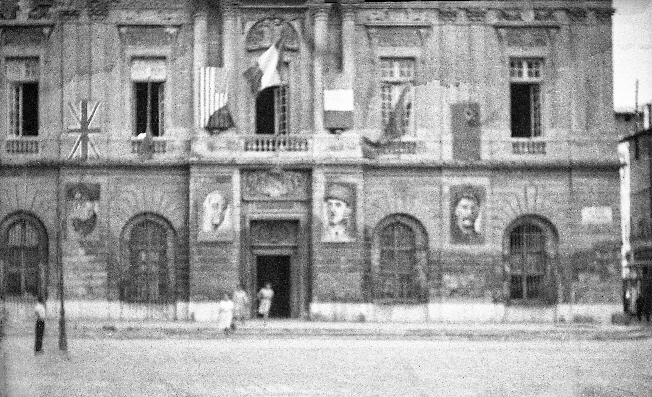 Arles Hotel de Ville (City Hall) showing Allied flags and portraits of de Gaulle, Roosevelt, Churchill and Stalin 