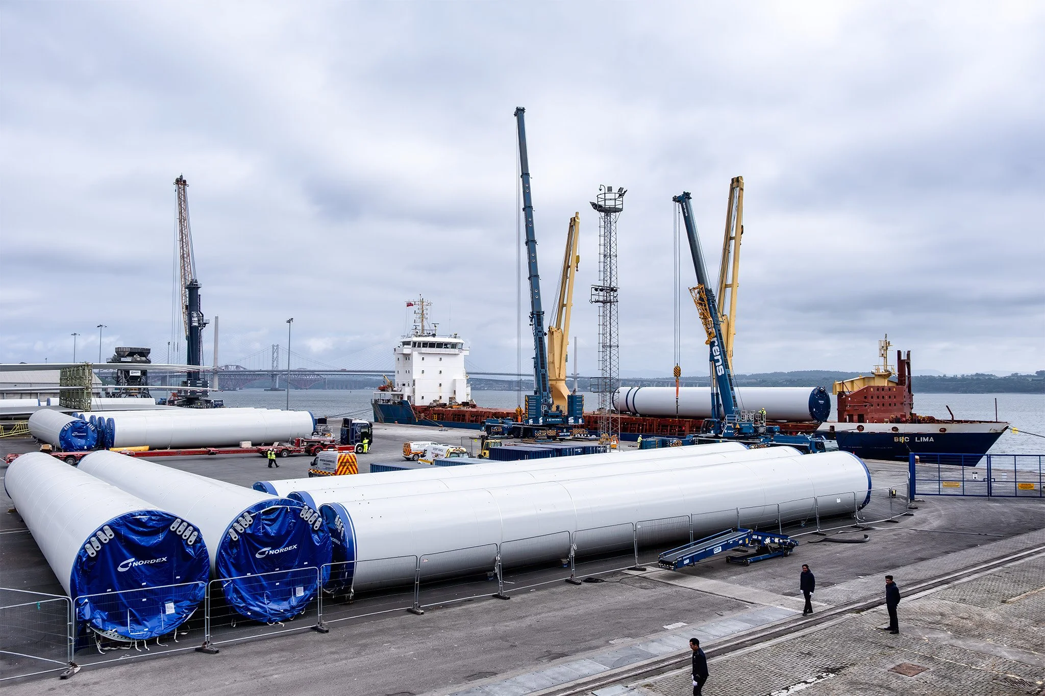 Wind towers and blades being unloaded at Rosyth Cruise Terminal outside of Edinburgh.