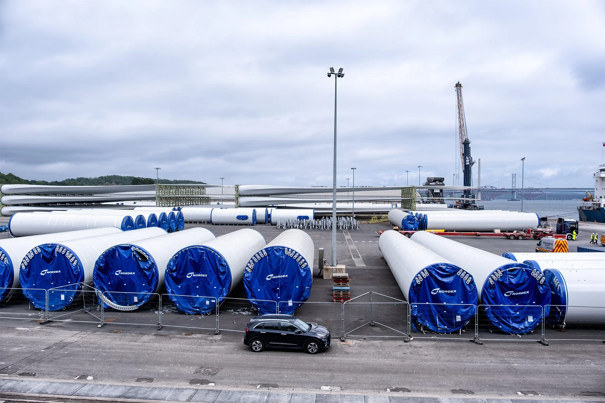 Wind towers and blades being unloaded at Rosyth Cruise Terminal outside of Edinburgh.