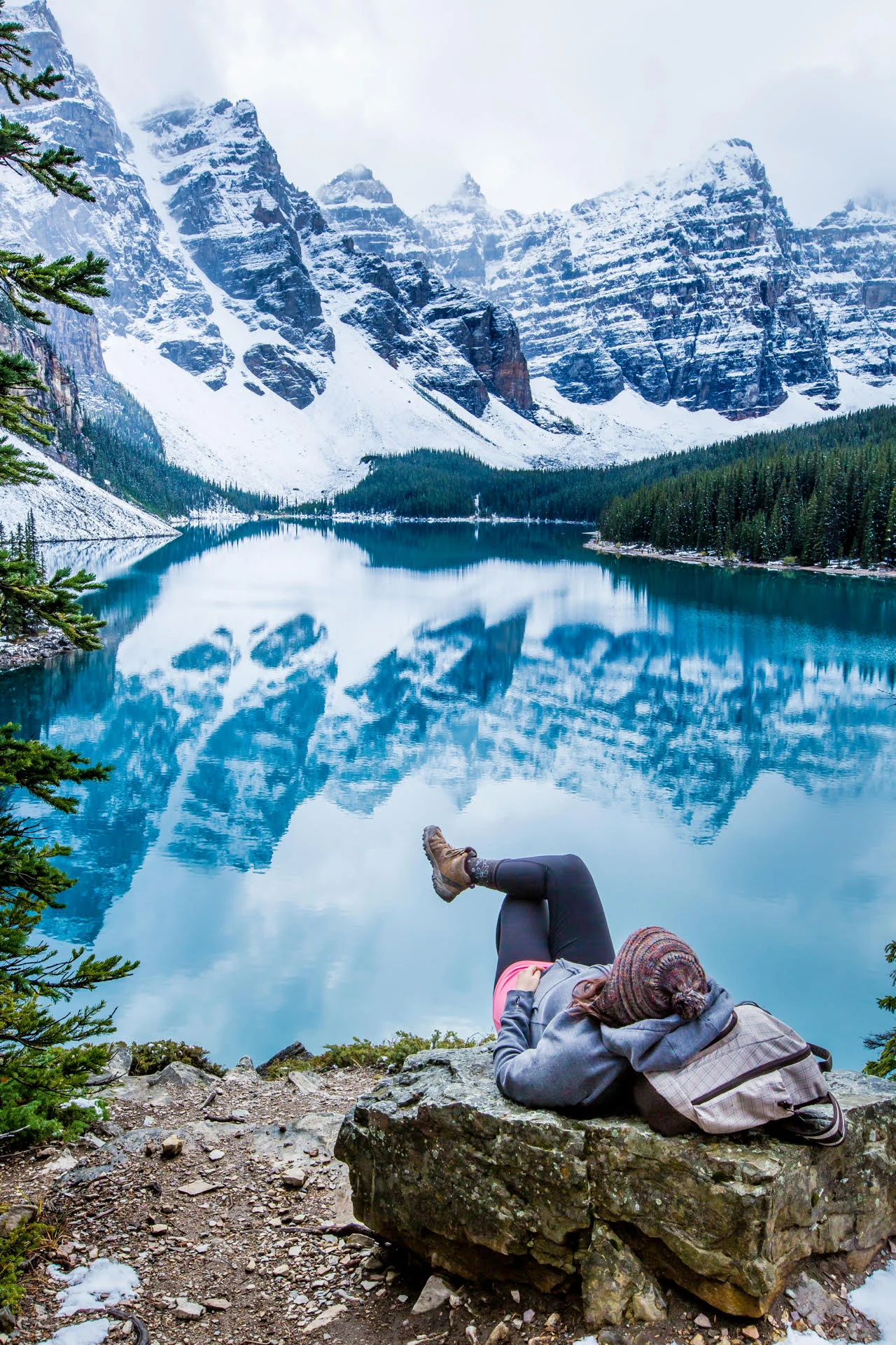 Girl on Rock Relaxing Moraine Lake