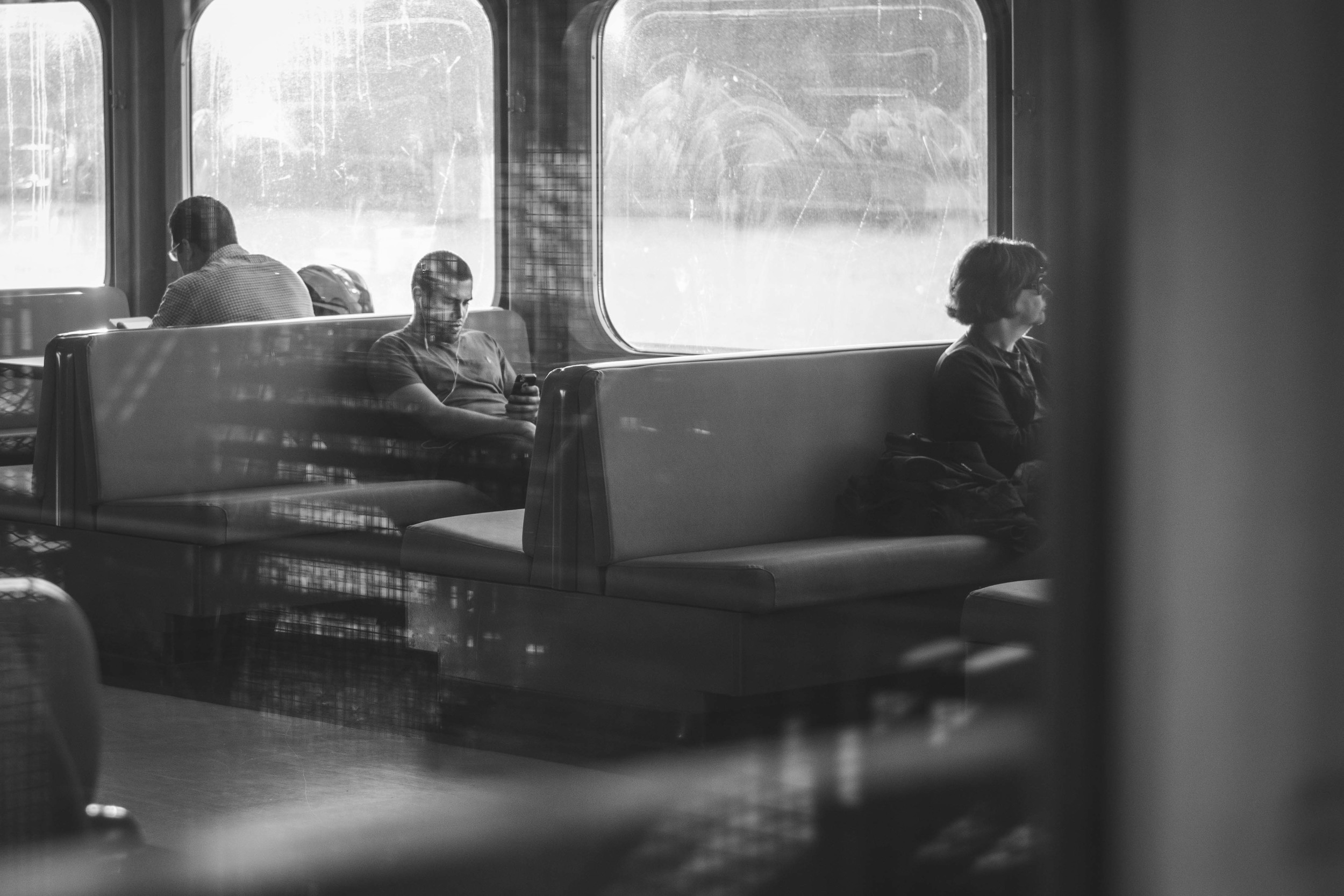 Seemingly daily commuters, waiting to get to their destinations