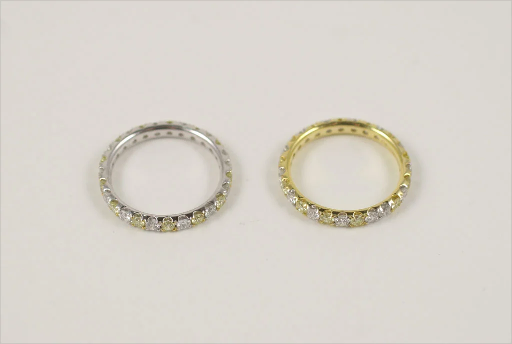 alternating fancy yellow and white shared prong stackable bands 6.jpg