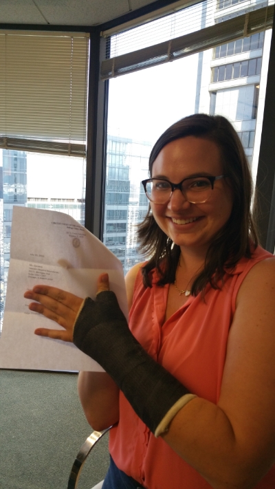  Caitlin with the hard-earned U-Visa certification