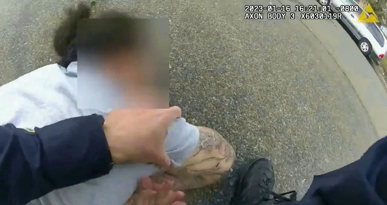 San Diego Civil Rights Attorney Alex Coolman - A bodycam still of a police officer using force in a takedown.