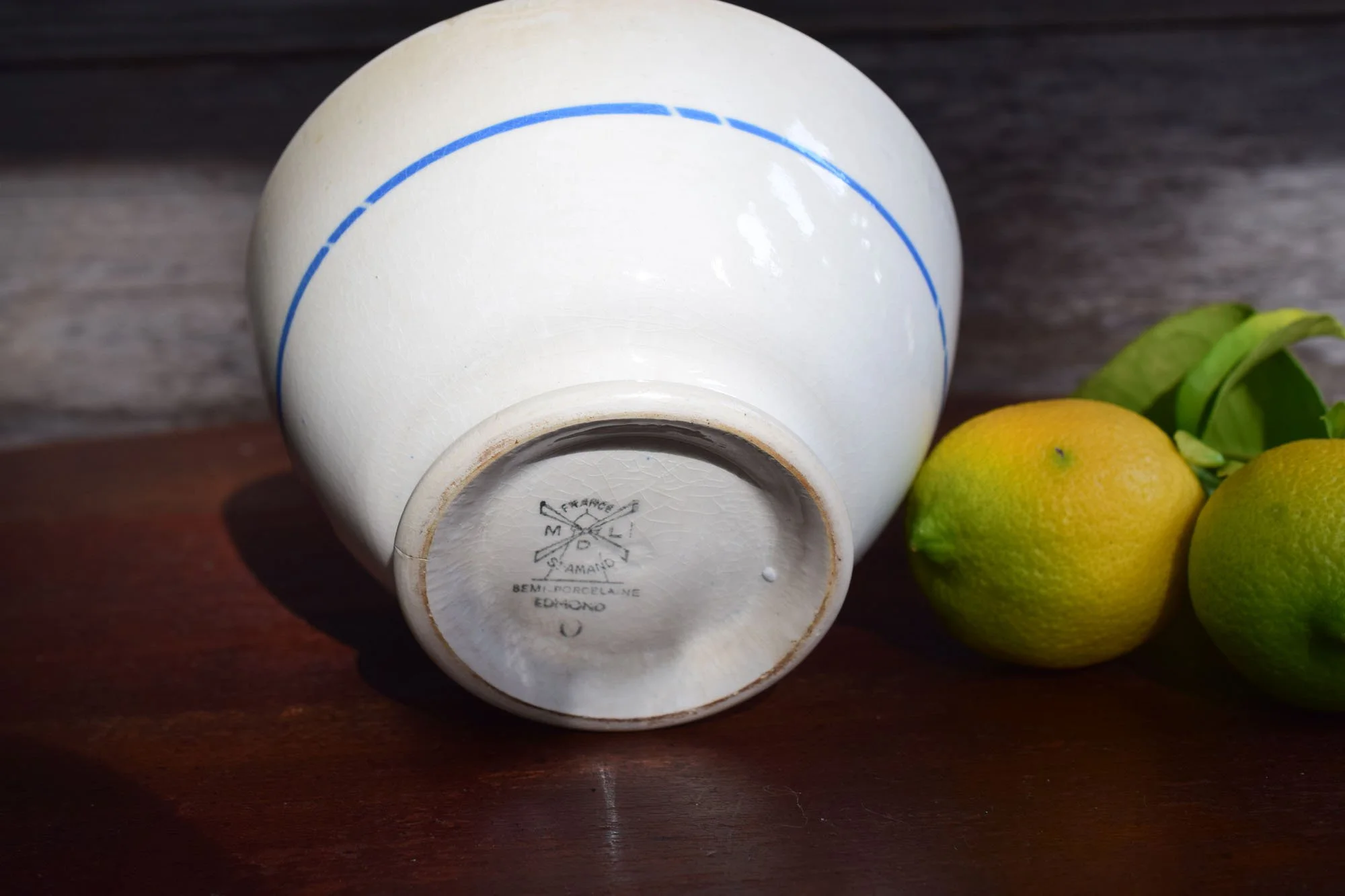 French semi-porcelain bowl by St. Amand, c. 1910.