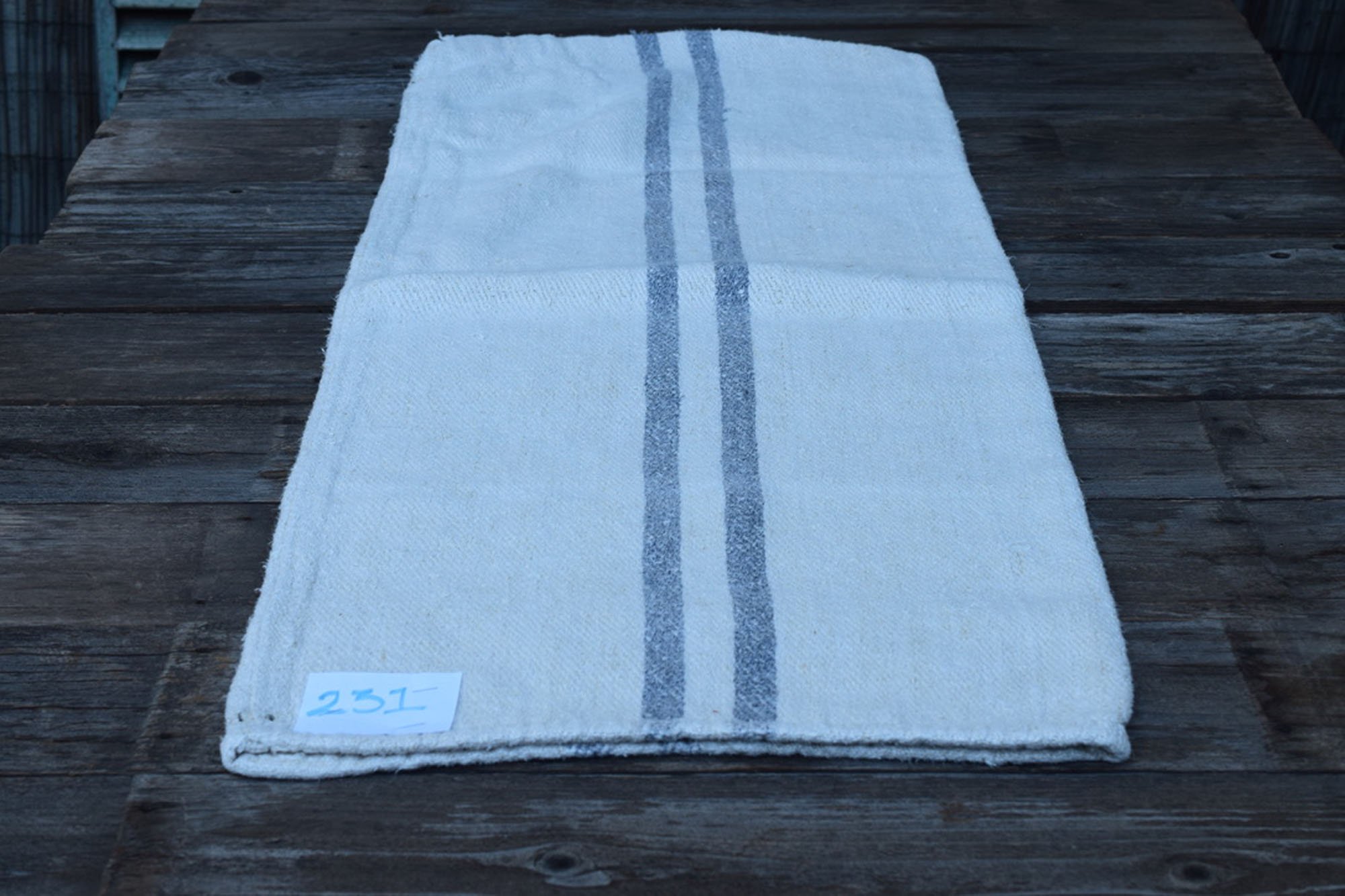 Antique French linen grain sack with blue stripes