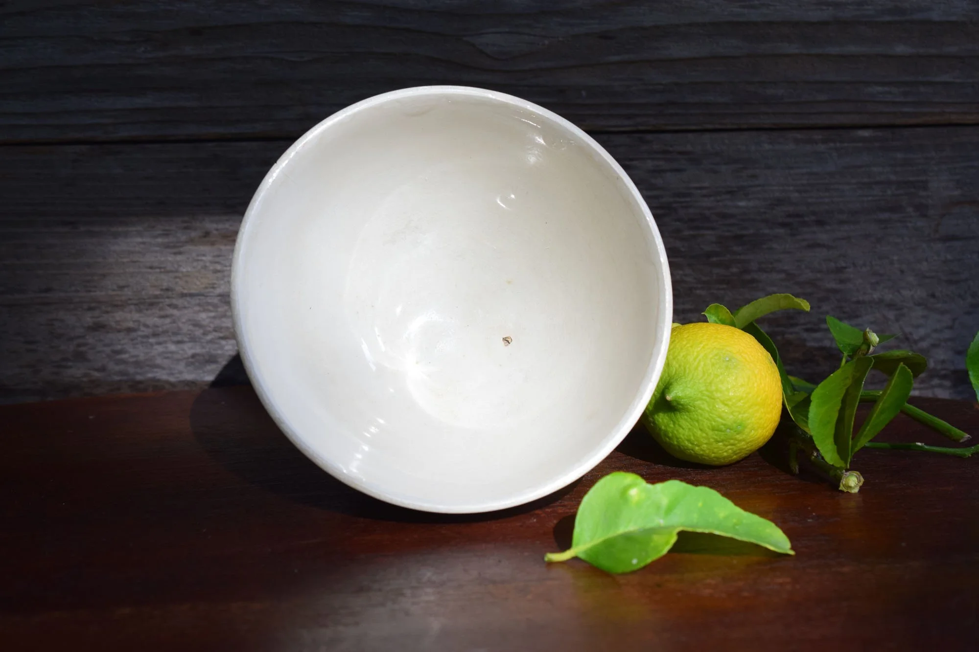 French semi-porcelain bowl by St. Amand, c. 1910.