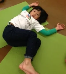 Keep your knees bent up to your chest, bring your arms into cactus arms and move the knees over to the right. Look to your left. Breath in through the nose and out through the nose 5-10 times or kids can do "Horse Breath" by relaxing their lips and blowing out to make a funny sound! Benefits: This pose helps with digestion, opens the chest/shoulders, and brings fluid within your spine. 