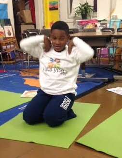 Sit on your heels or in Pretzel place your hands on your shoulders with elbows pointing forward. Start moving your elbows in a backwards circular movement. When the elbows are pointing behind, gently squeeze the shoulder blades together to open the shoulders and chest. Do this circular movement 10 times. Encourage kids to count to 10 in English, Spanish, or another language! Benefits: This removes any toxins sitting in the shoulder joints and encourages the chest to open. 