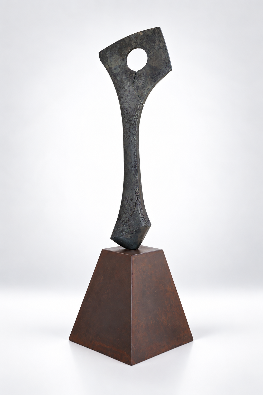 Metal sculpture by artist Kyle Lusk against a white gradient background.