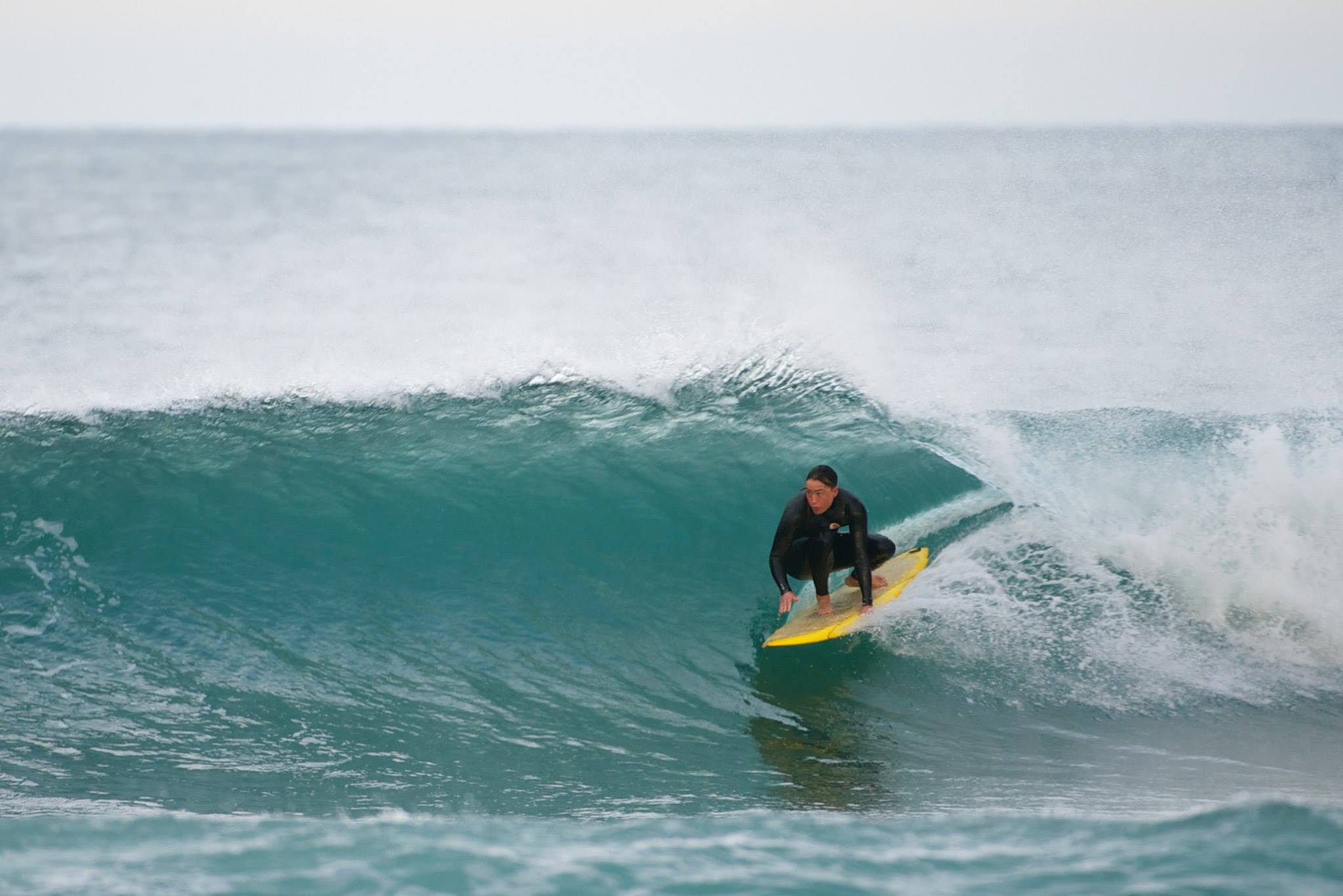 Cruising through the pocket on an old school single fin. Photo: Richard Mattison