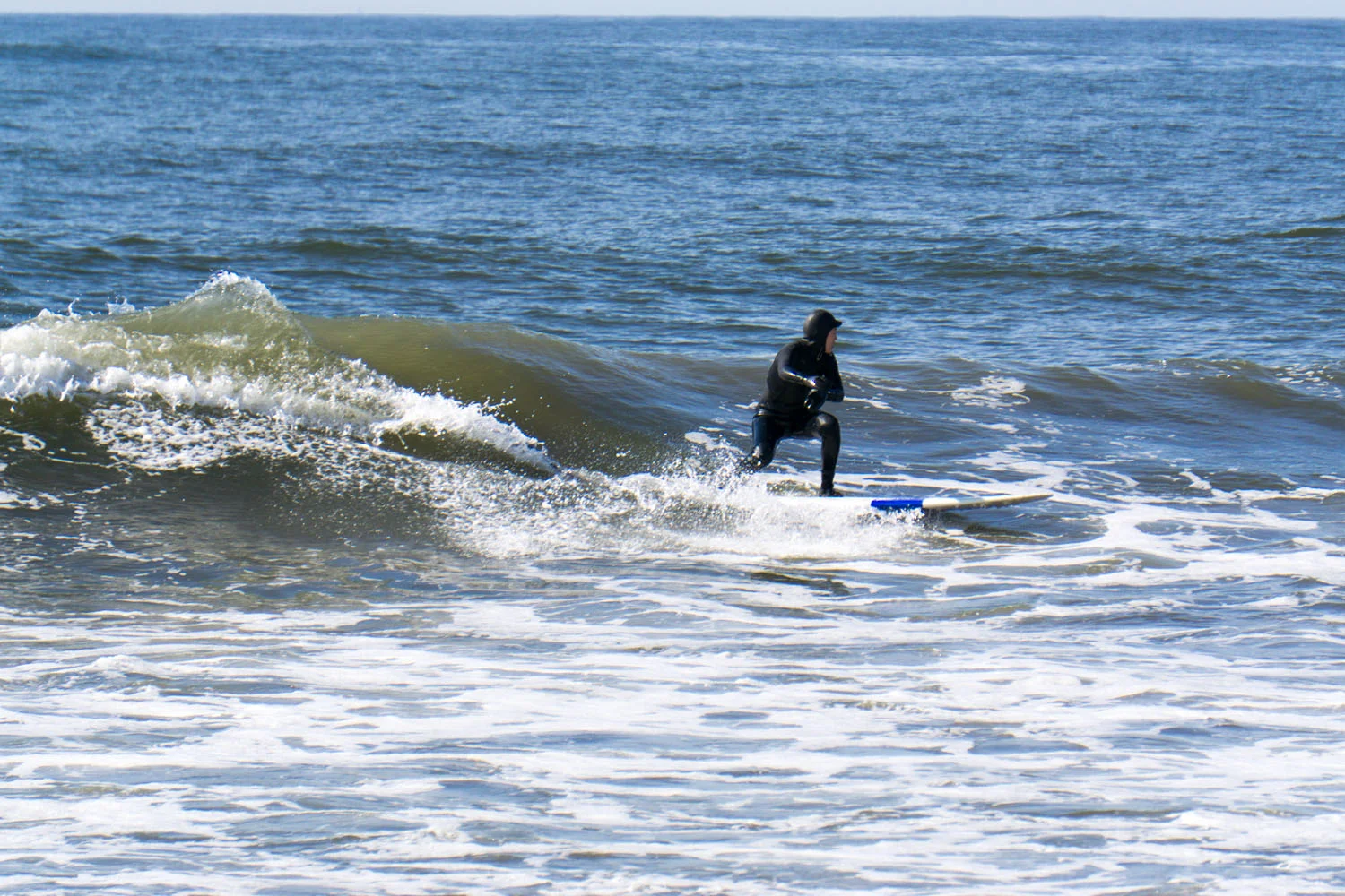 Conatus student, Kyungmi, going left with style in Rockaway. Pic: Eric Perkins ericperkins.smugmug.com