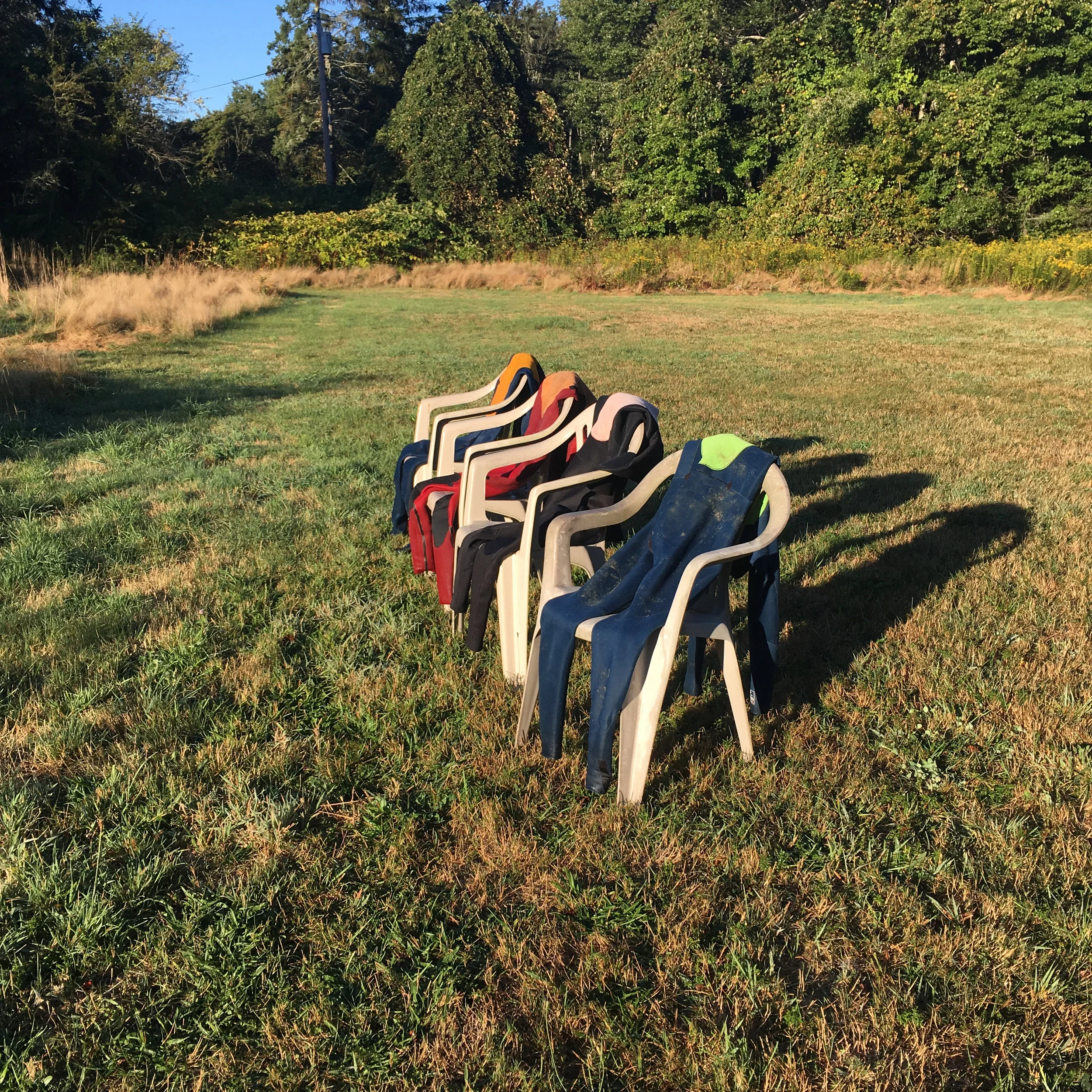 A bevy of 3/2s drying in the Rhode Island sun, ready for multiple surfs #moresuitsmorejoy Pic: Dion Mattison 