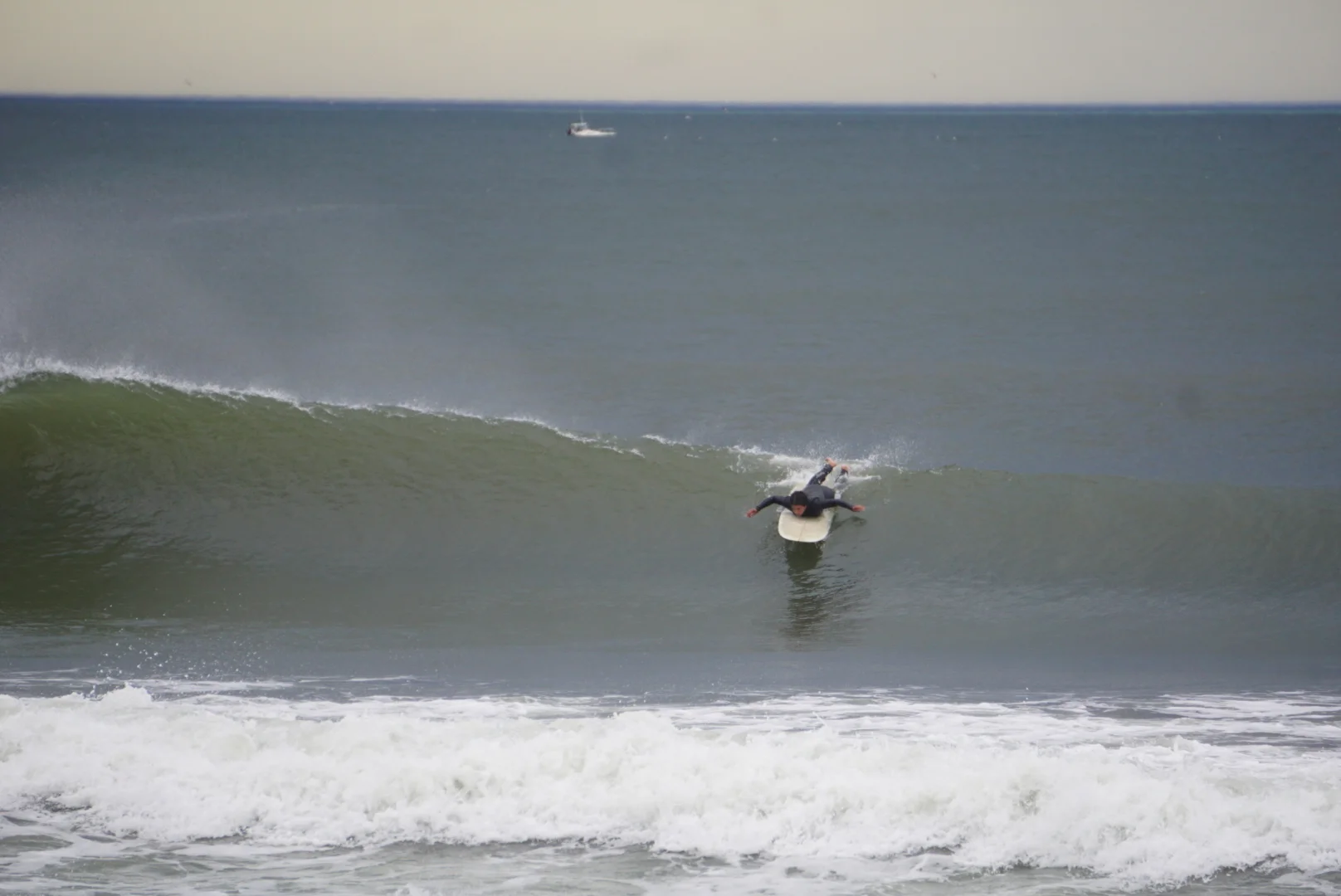 Christina paddling into a left. Photo: Dion Mattison 