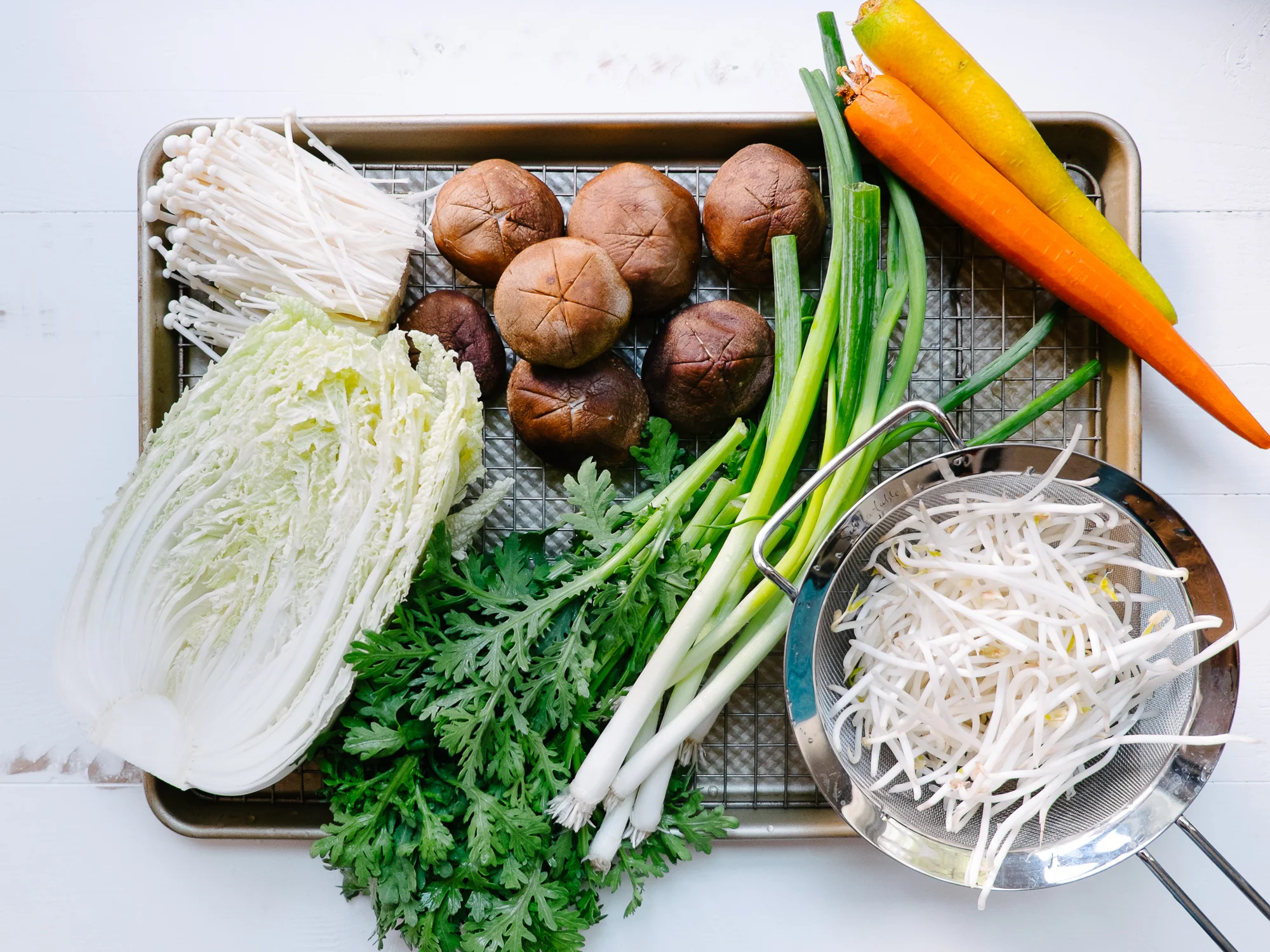 Here's a tip when you're working on broth-based recipes with lots of veggies, give 'em all a good wash, then set them up on a wire rack and baking sheet and let them drip dry. #kiss (keep it simple, stupid) (jk on the stupid, you're not stupid)