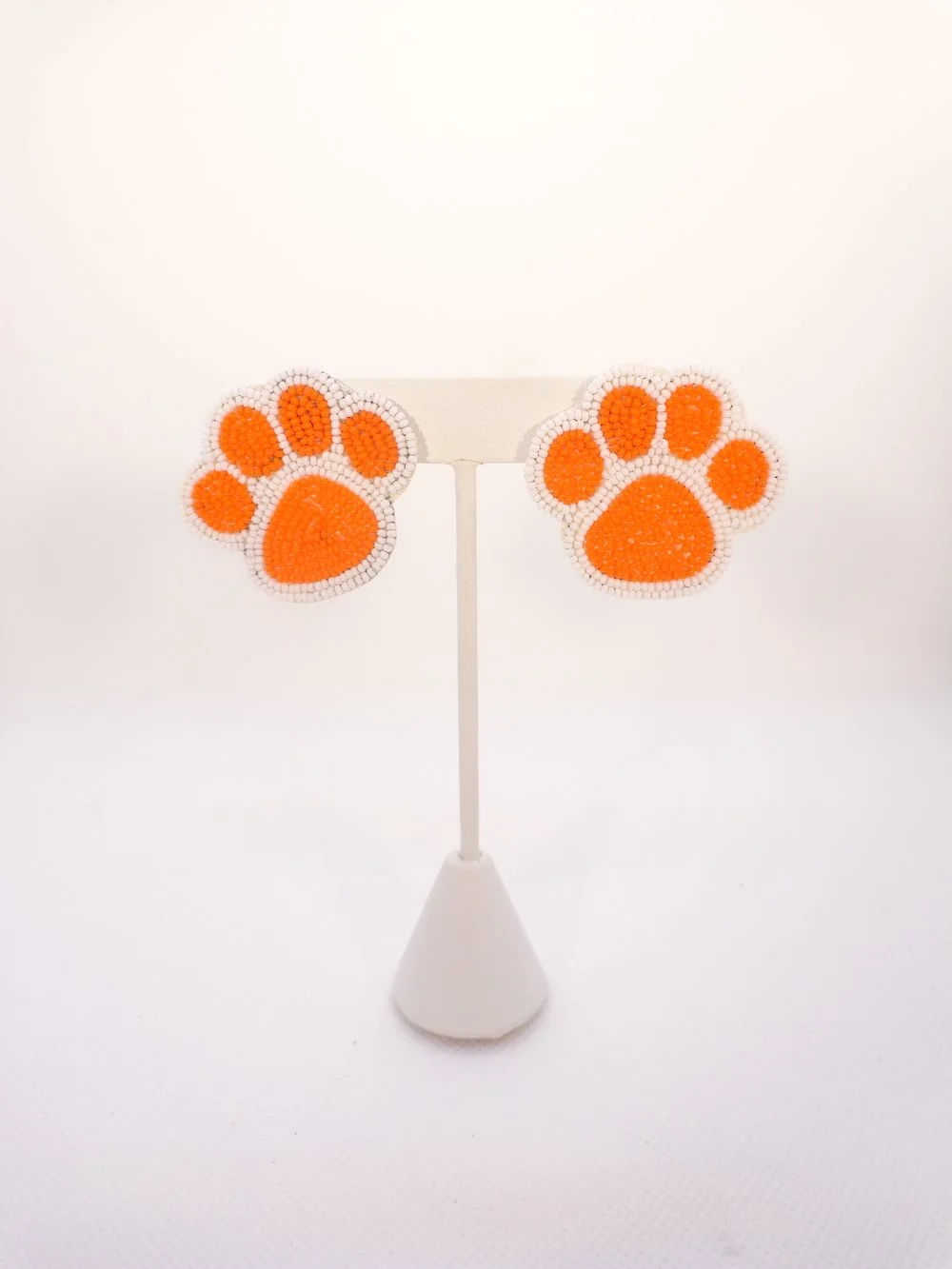 Beaded Paw Print Earrings - Orange on White Background