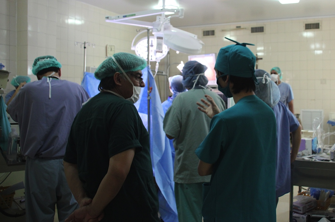 Several local medical professionals observe a surgery by Dr. Katie Gualandri & Dr. Carrie Giordano.