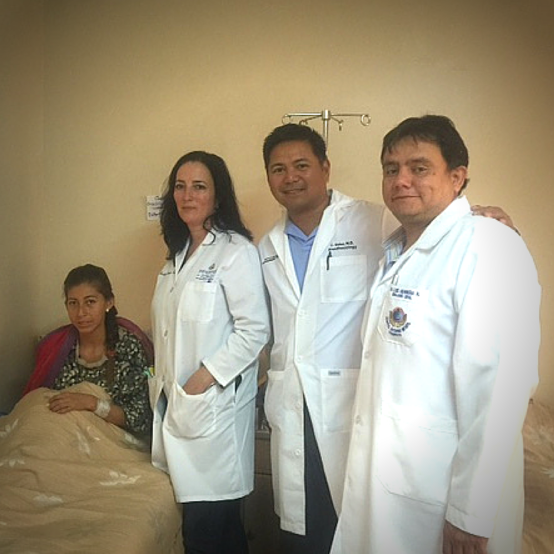 Recovering patient, Teresa, Dr. Gay Garrett, Dr. Andy Guiao, and Dr. Lucho.