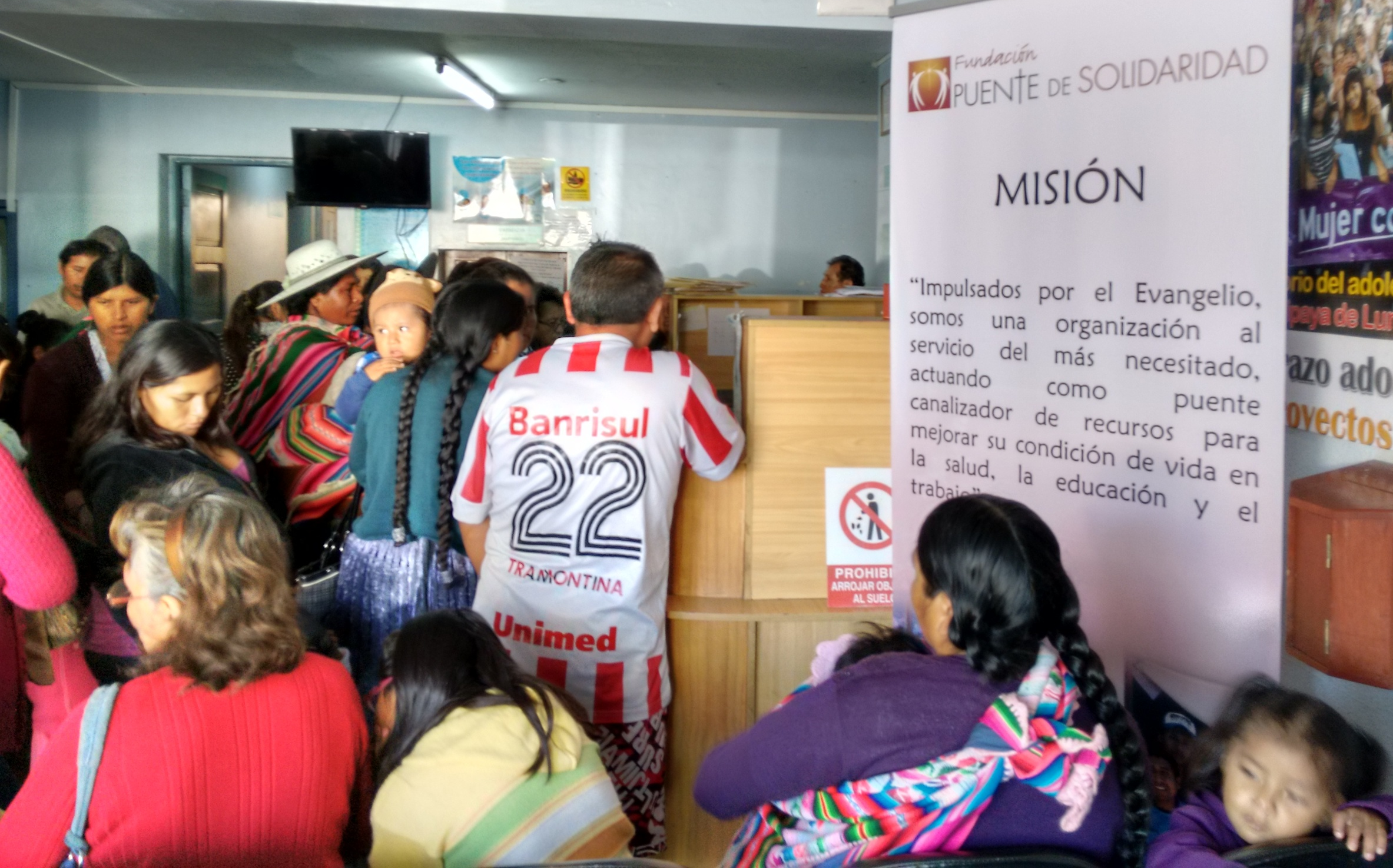 Families in the waiting room at Tiquipaya Hospital are greeted by the mission of Puente de Solidaridad posted in the room.