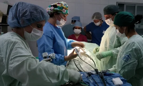 Dr. Garrett and Dr. Herrera work together on a laparoscopic procedure during our 2014 mission trip to Tiquipaya. 