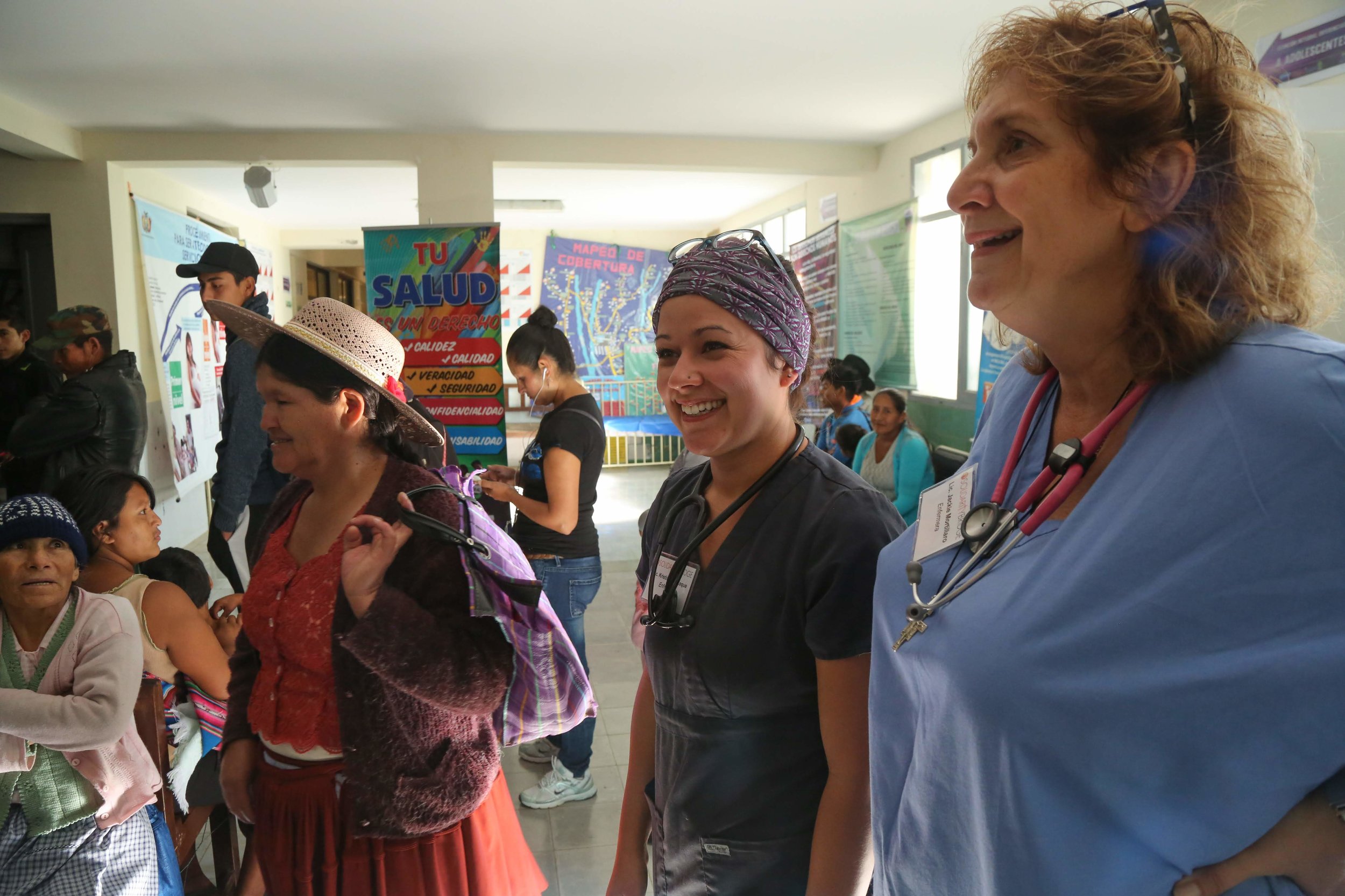  Greeting patients in the reception area with fellow mission nurse, Jackie Mortillaro.  