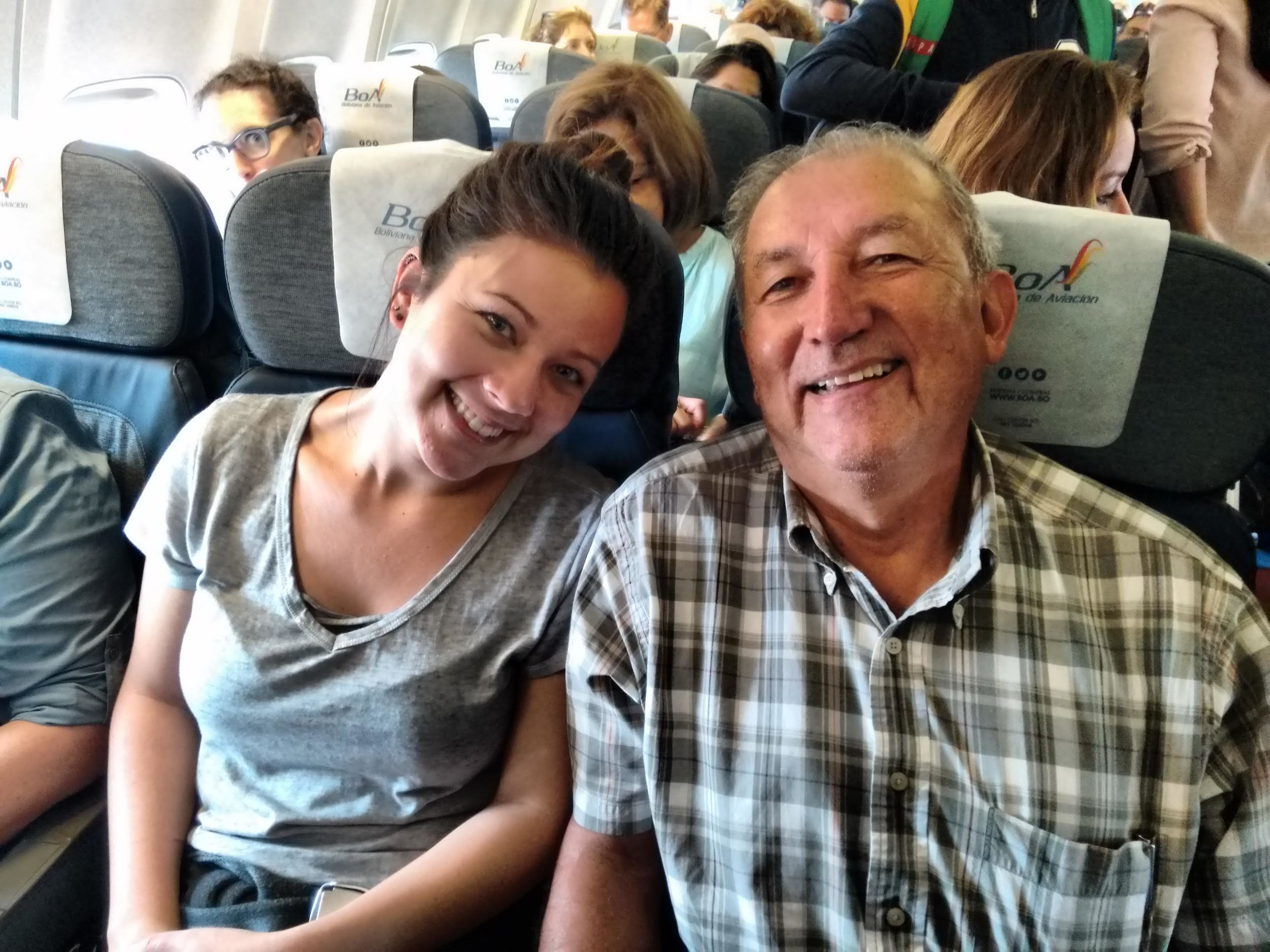  Kristina, with her grandfather and Solidarity Bridge co-found, Enrique Via-Reque, on a flight from Santa Cruz to Cochabamba 