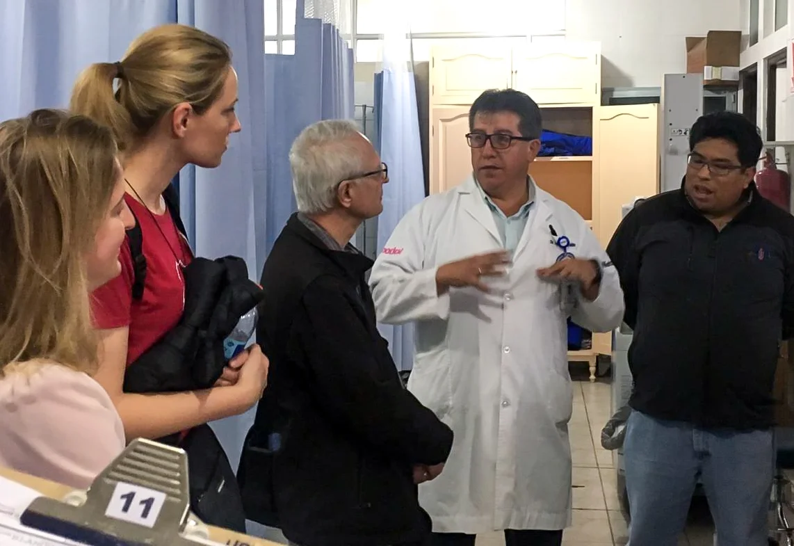 The mission team interviews Dr. Marcelo Valdivia regarding current capacity in the Santa Bárbara Hospital's Emergency Department.