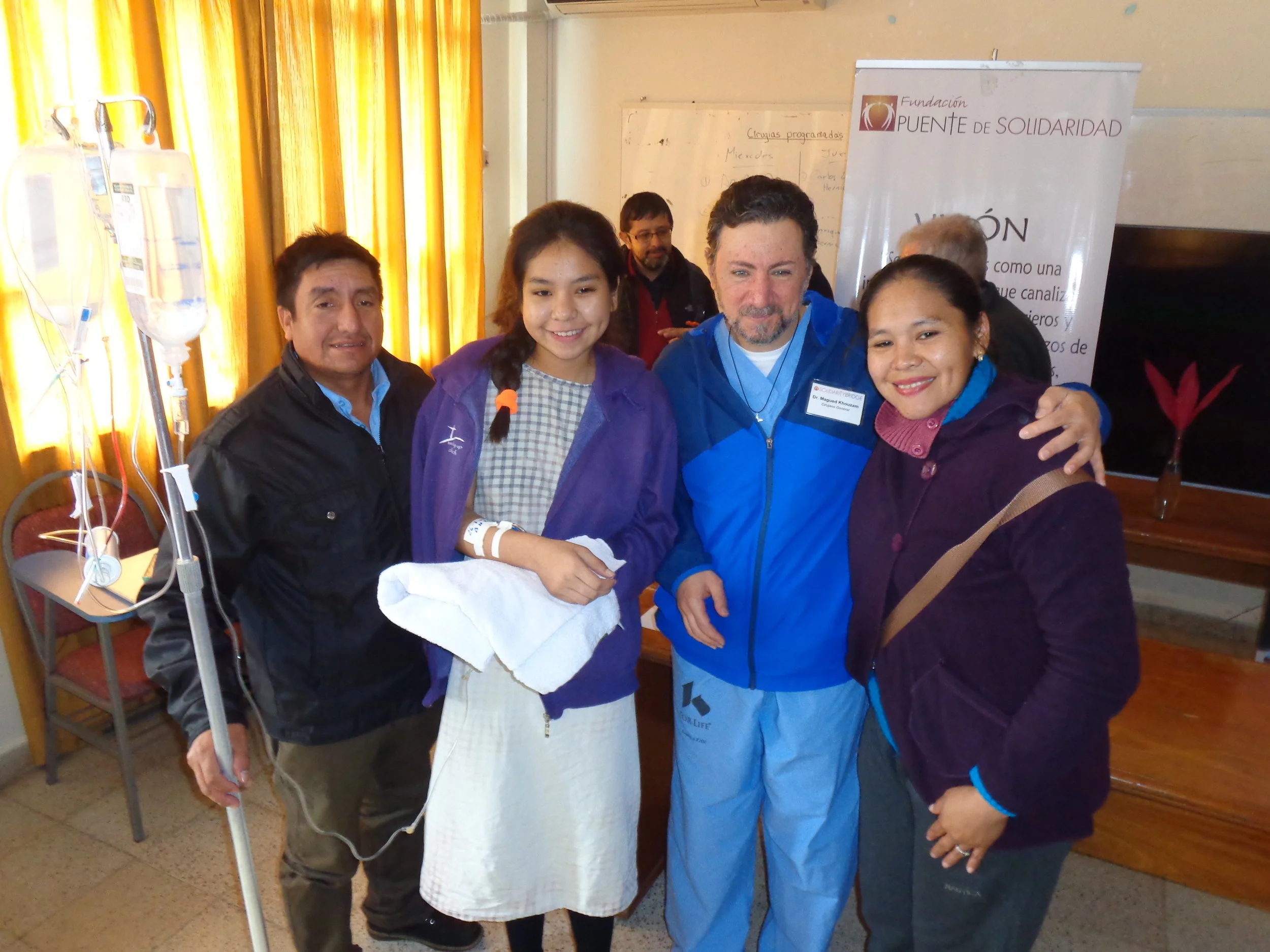 Ana Paola (second from left) is pictured here with her parents and US missioner, Dr. Magued Khouzam.