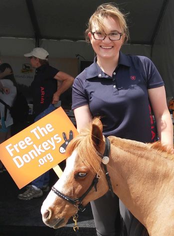 Brooke USA Advocates Sarah Schaff and Patrick The Miniature Horse show their support for FREE THE DONKEYS!