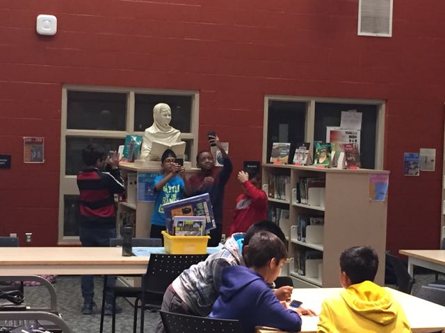 Malala sculpture at home in the Lougheed Middle School library