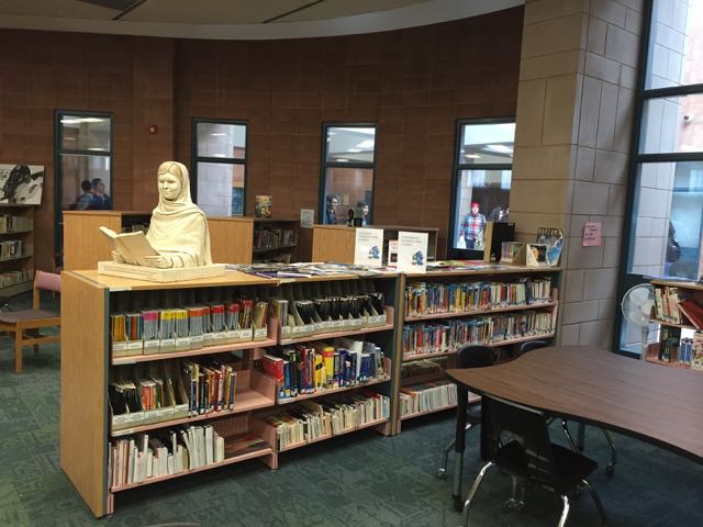 Malala sculpture at home in the John Fraser Secondary School library
