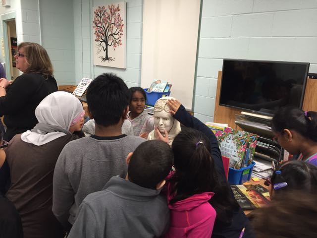 Students at Floradale Public School interacting with their Malala sculpture