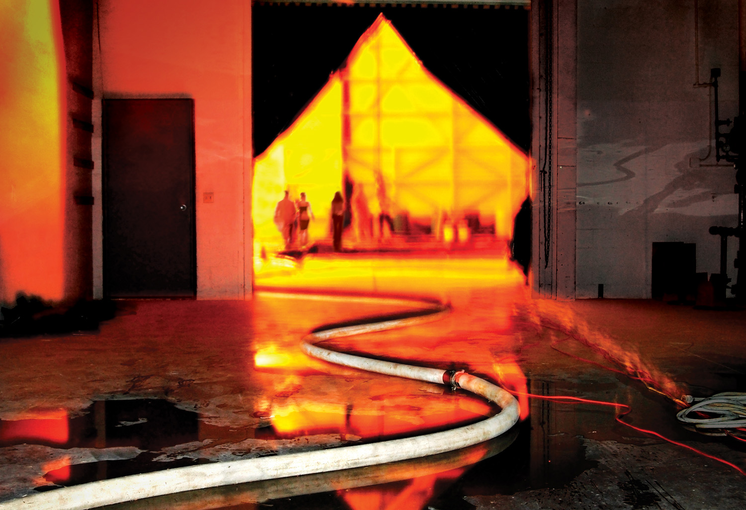 Two fire hoses were used to wash the Great Picture on the evening of development. Temperatures exceeded 100 degrees and the fumes from the chemistry were at times overwhelming.                  