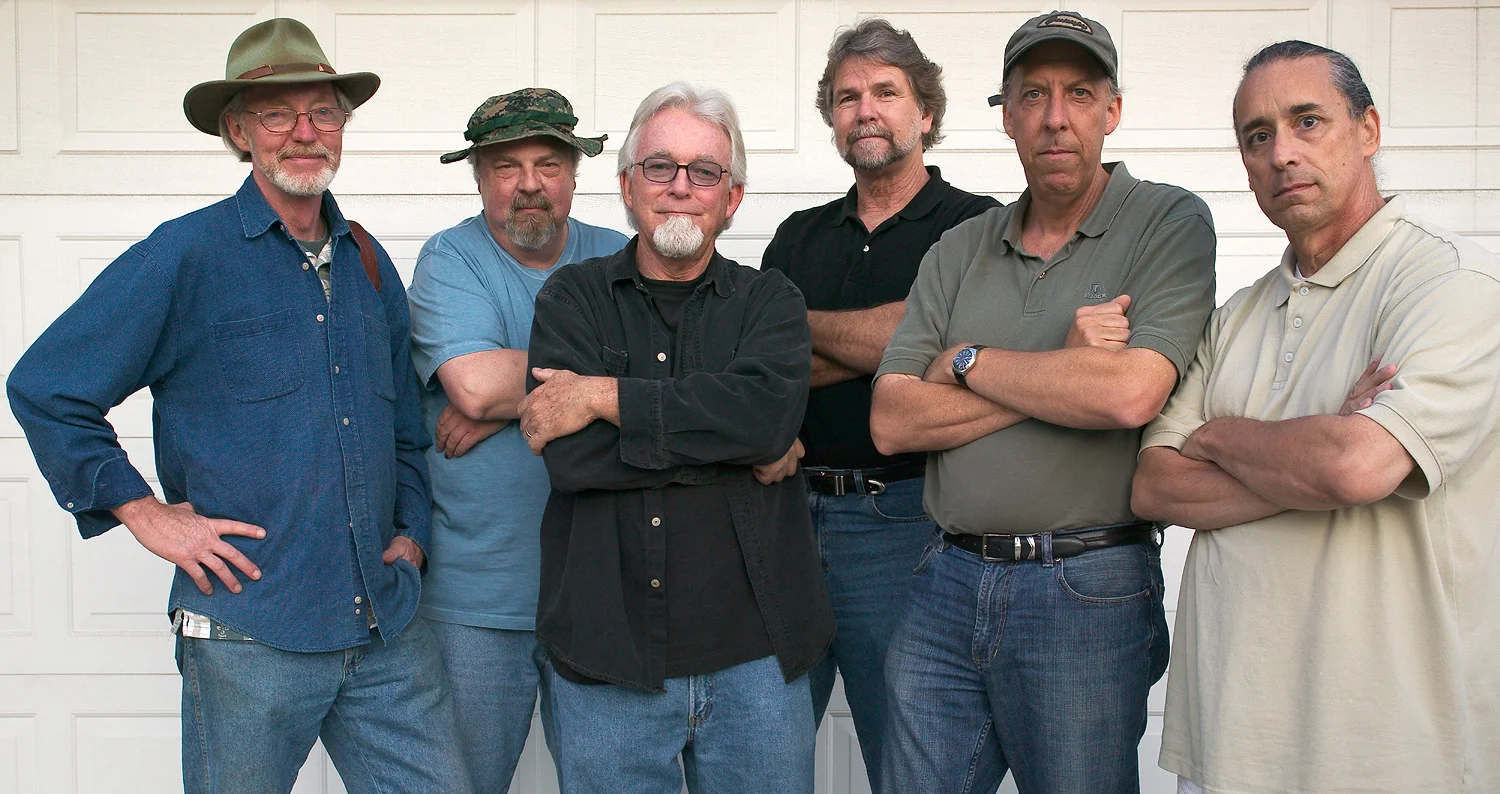 Partner's-in-crime: l to r - Mark Chamberlain, Rob Johnson, Jerry Burchfield, Jacques Garnier, Douglas McCulloh, Clayton Spada.