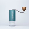 Alpine Lagoon Comandante C40 Hand Coffee Grinder MK4 featuring high quality stainless steel burrs and an ergonomic design ideal for precise and consistent grinding for coffee enthusiasts 