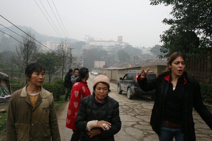 Private developers have moved into Ge Le Shan village just outside Chongqing- and that means hundreds of farmers are being evicted from their land. Yu Shu Rong, on the far left, has been bravely protesting her eviction.