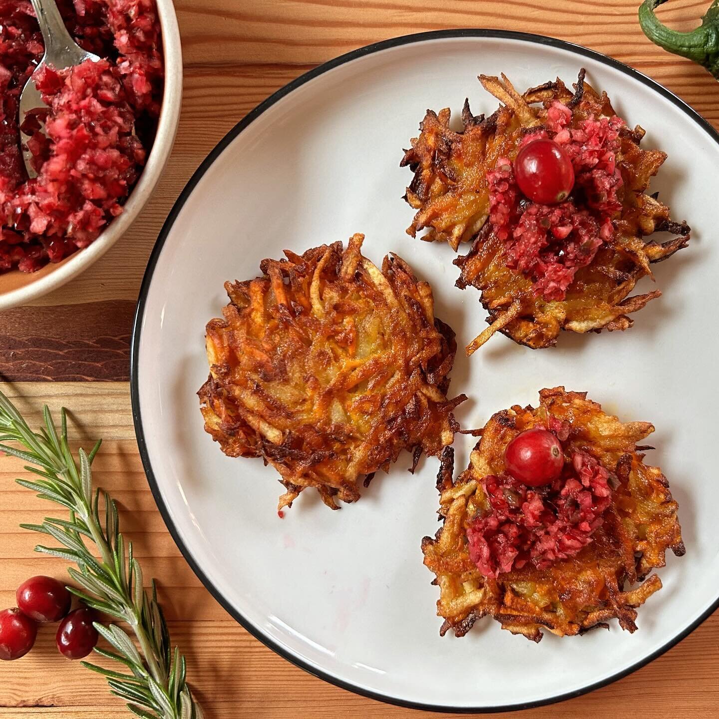 The first night of Hanukkah &mdash; may it bring in more light in more forms than we can even imagine. 

Recipe for sweet potato (with potato) #latkes topped with cranberry salsa is up now - link in profile. Very into all things cranberry, and this s