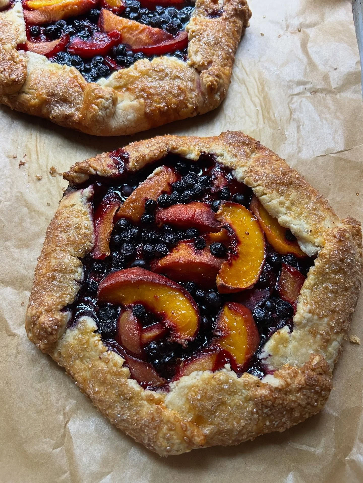 As the evenings get cooler, I am baking more and more. Peaches and Italian plums have both been at the farmer&rsquo;s market (although peaches are firmly on their way out). The peaches feel like an ode to end of summer, and the plums welcome in a new
