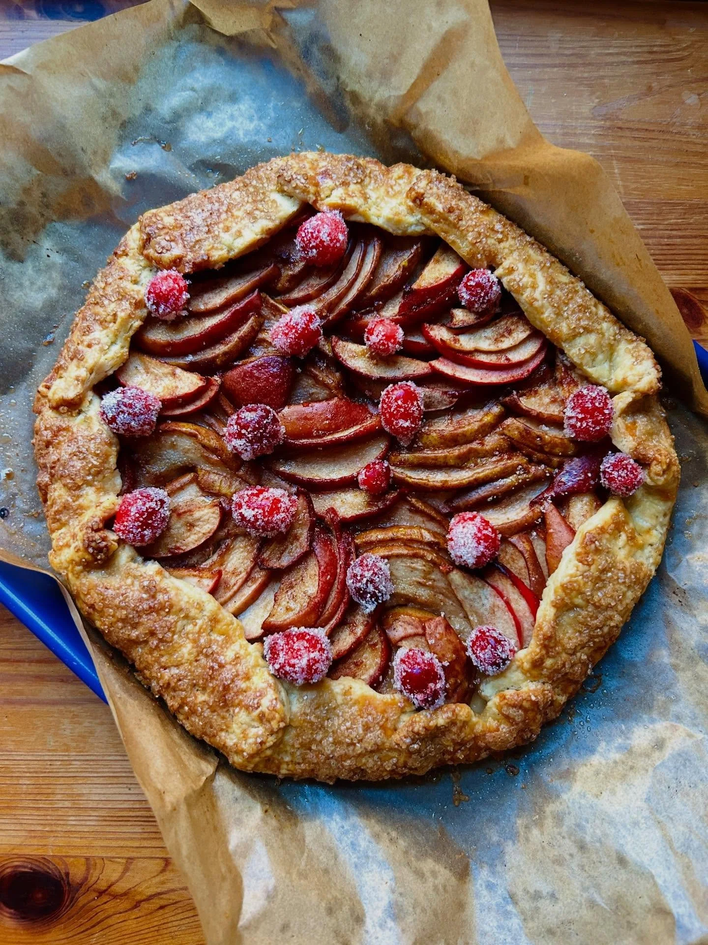 Pear marzipan #galette with candied cranberry. Brought to a friend&rsquo;s house for dessert after dinner. Baking this felt like the kick-off to the holiday season. 🍐

I love how easy candied cranberries are to make, and of course, are so pretty and