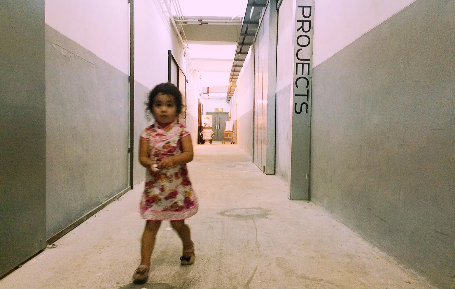 Artichoke Canteen ...down the hall and to the left. Felix walking backwards as it's way past her bedtime.