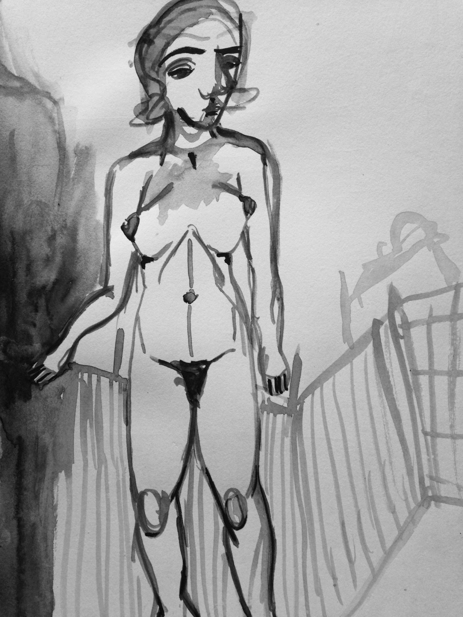 Lady dressing behind a wind break