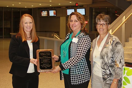 2014 Corporate Friend of Science Award was presented by Kelen Panec, Chair of the Iowa Science Teaching Section. Accepting for KEMIN are Penny Woods (L) and Zita Quade.