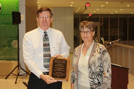 Peter Holden, North Tama Schools &amp; Mayor of Traer receives Friend of Science Award presented by Kelen Panec.