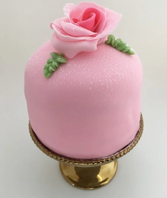 Whether it’s white almond, dark chocolate, or a princess cake, Kris Torres makes it happen.